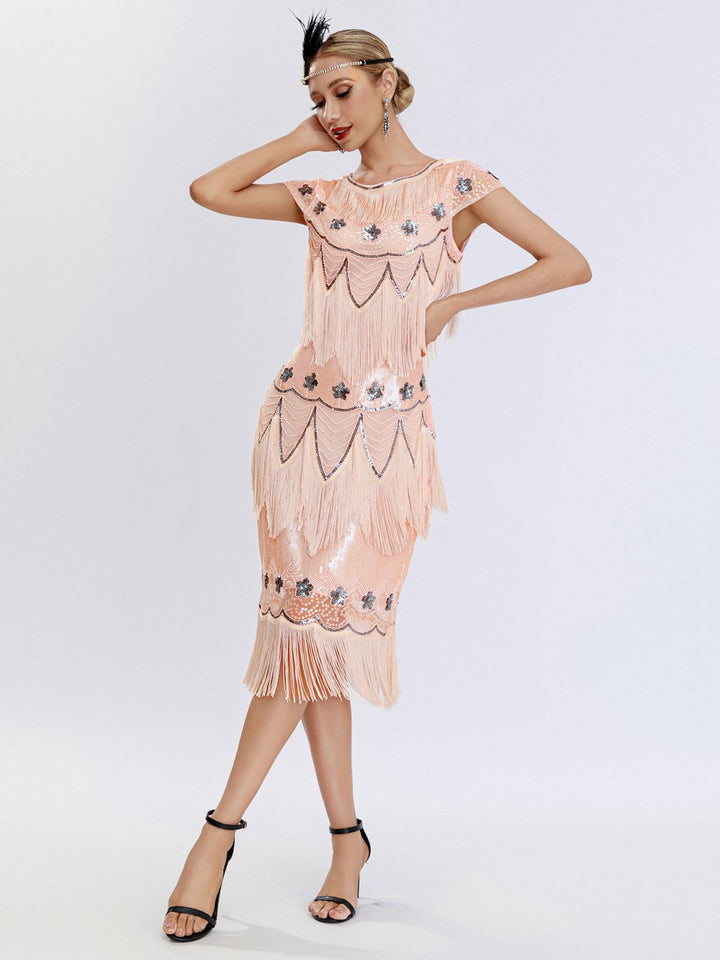 She slips into this 1920s Charleston Sequins Tassel Patchwork Dress and suddenly it&