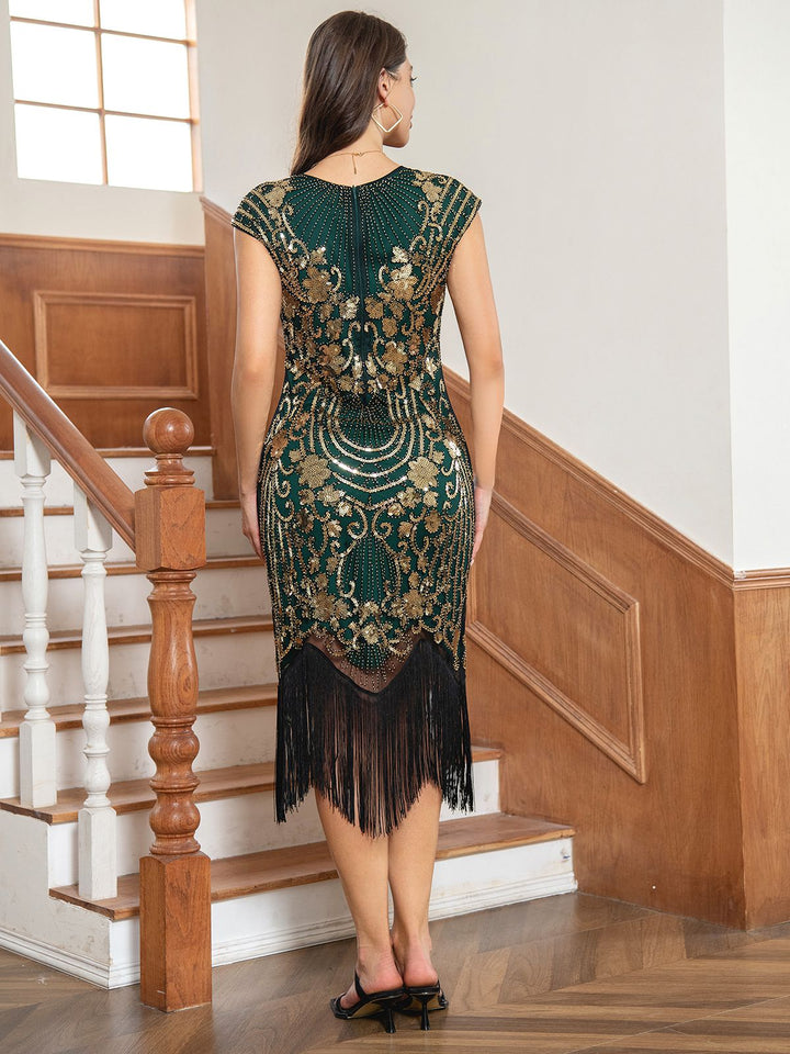 She slips into this 1920s Floral Pattern Sequined Tassel Dress and suddenly it&