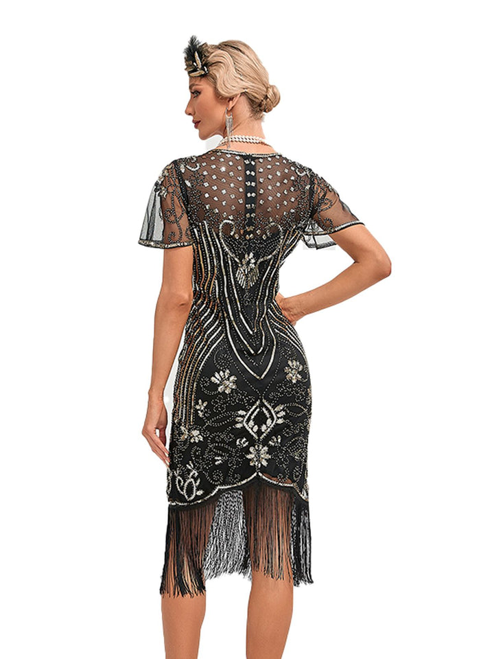 She slips into this 1920s Fringed 3D Beaded Dress and suddenly it&
