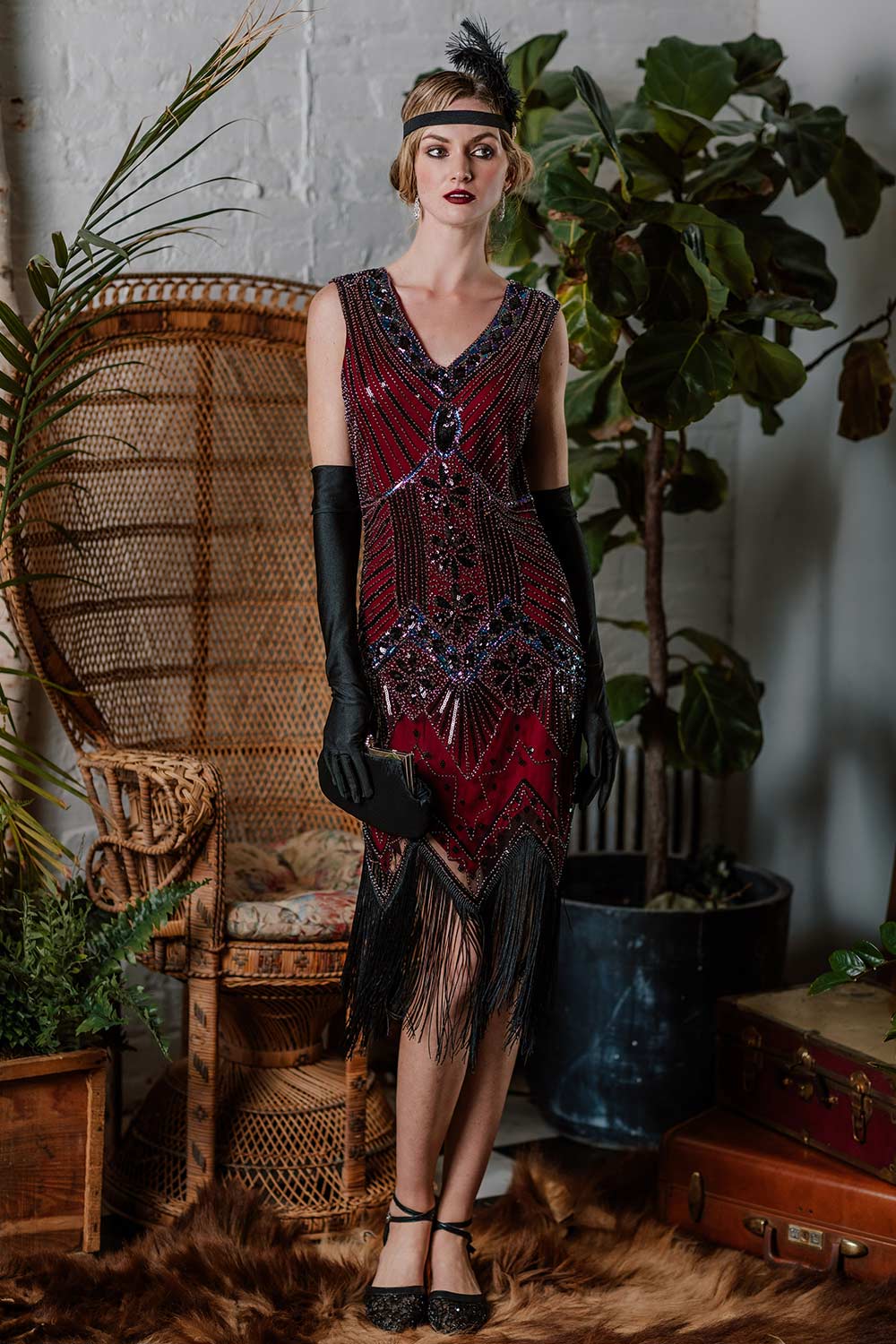 She slips into this 1920s Sequined Fringe Dress and suddenly it&
