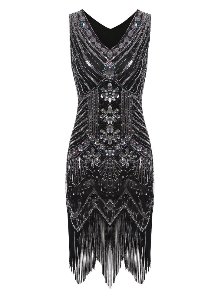 She slips into this 1920s Sequined Fringe Dress and suddenly it&