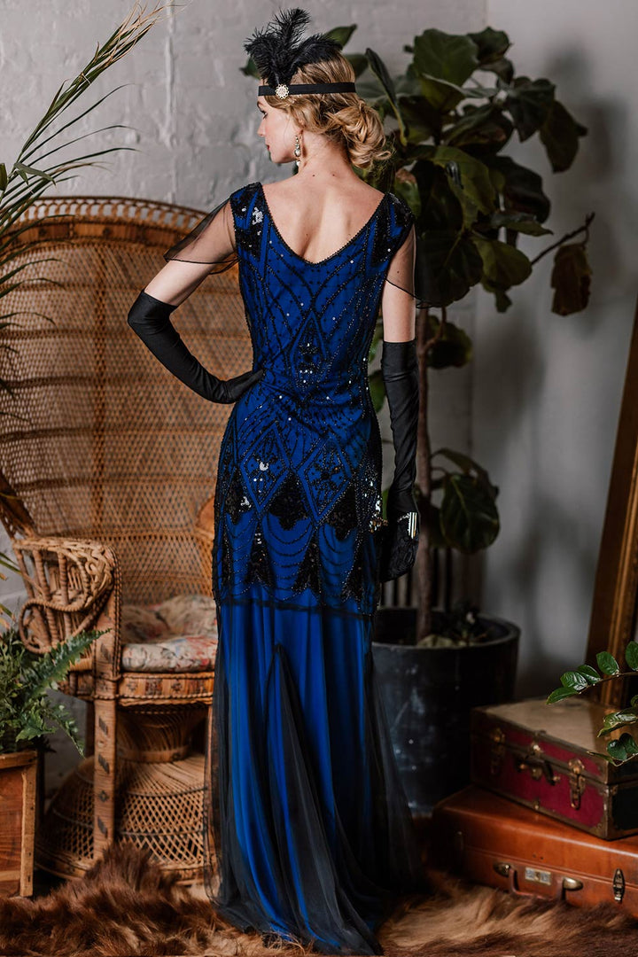 She wears 1920s Sequined Maxi Flapper Dress with 1920s grace