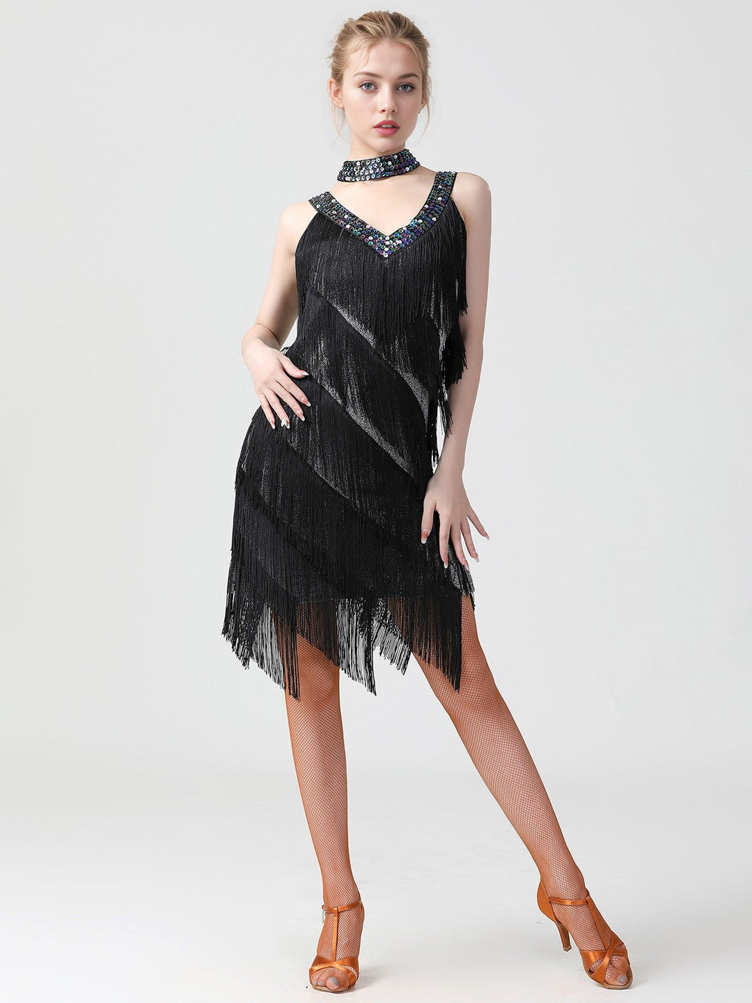 She slips into this 1920s Sequined Sleeveless Fringed Hem Dress and suddenly it&
