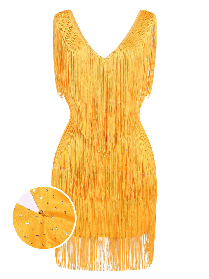 She slips into this 1920s V-Neck Fringe Solid Sleeveless Dress and suddenly it&