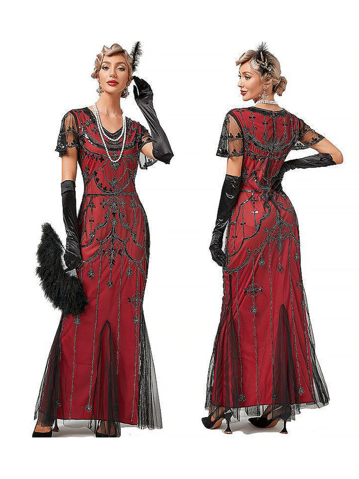 She slips into this 1920s V-Neck Sequined Mesh Mermaid Formal Dress and suddenly it&