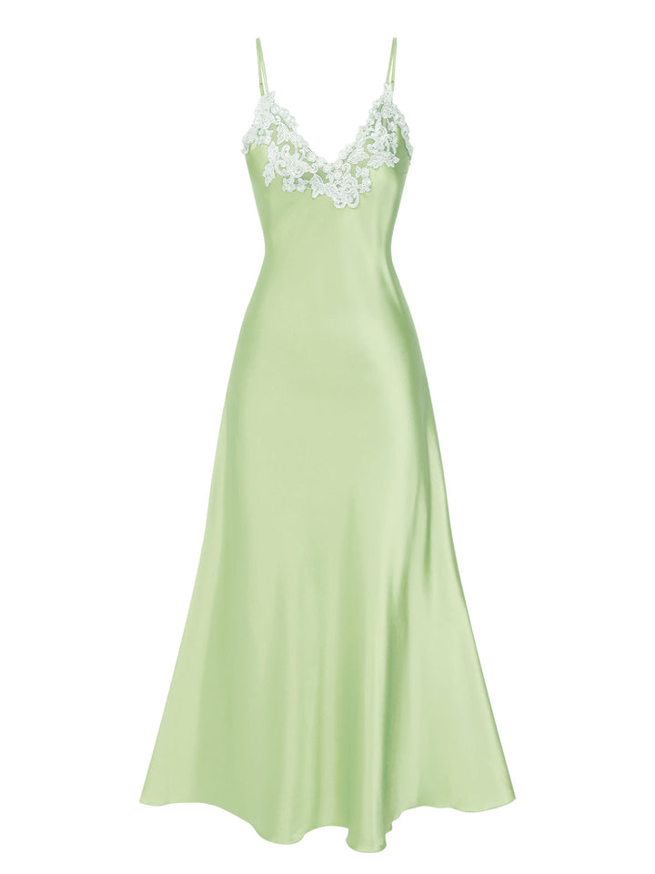 She slips into this 1930s Embroidered Faux Satin S