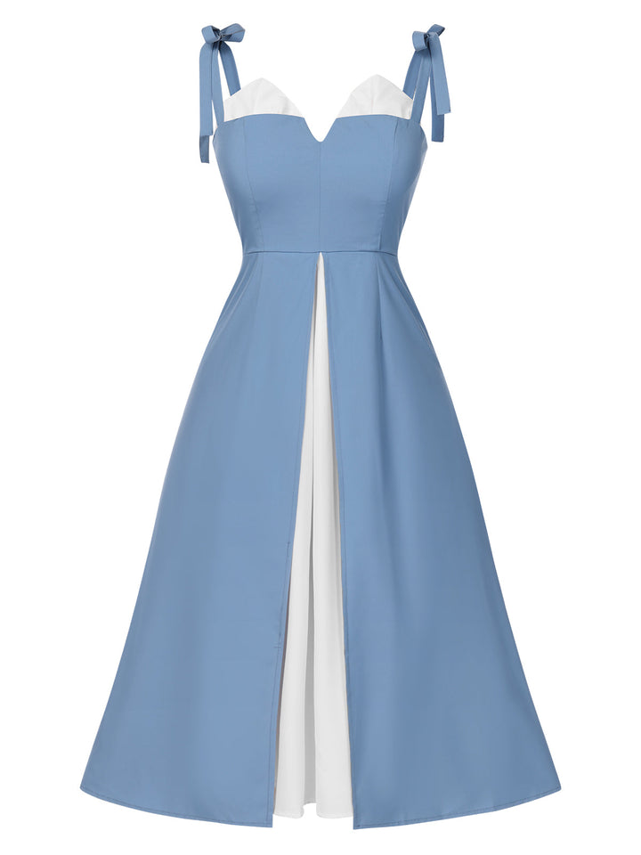 She slips into this 1940s Colorblock Spaghetti Strap Dress and suddenly it&
