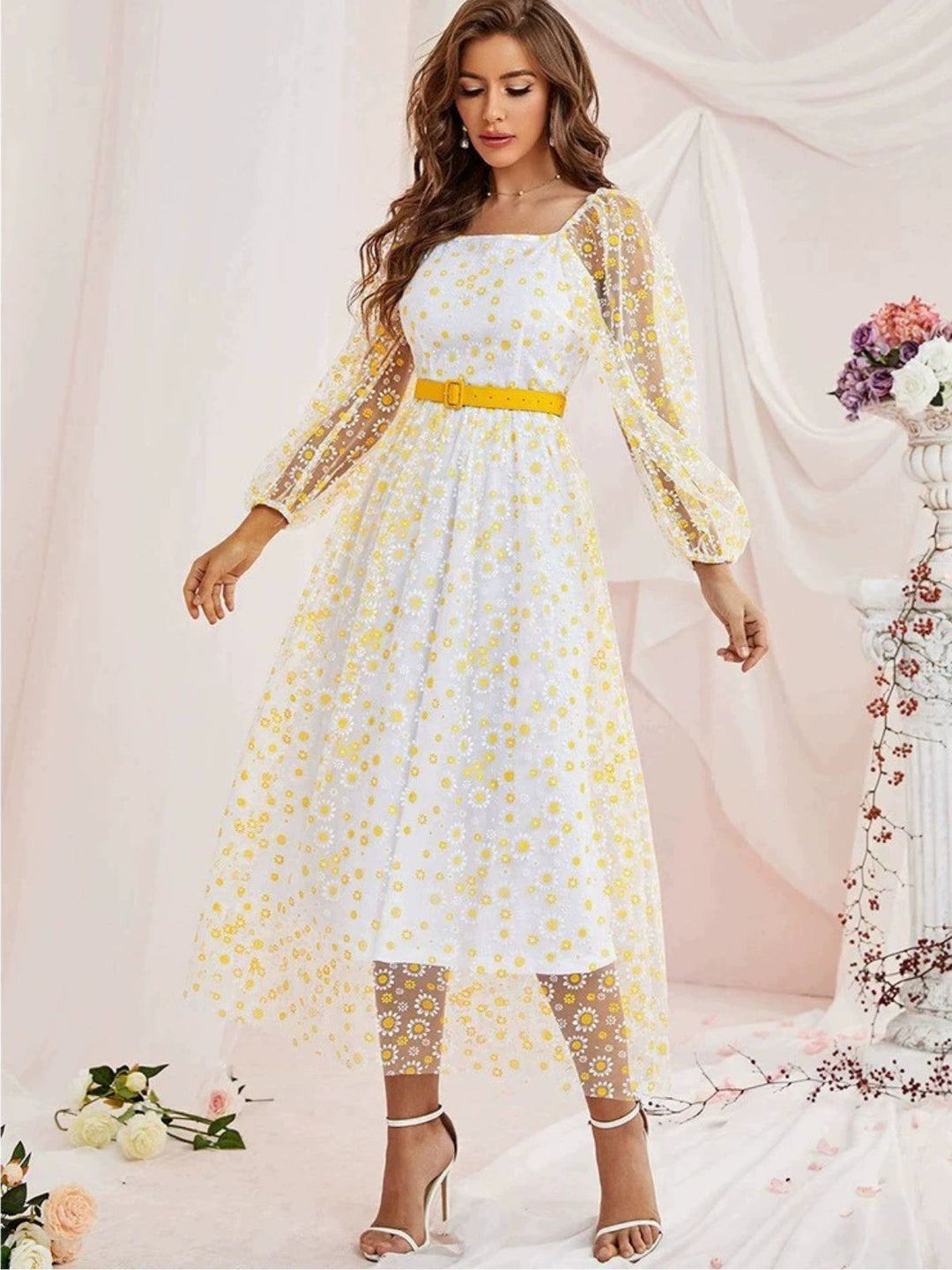 She slips into this 1940s Floral Illusion Square Neck Belt Dress and suddenly it&