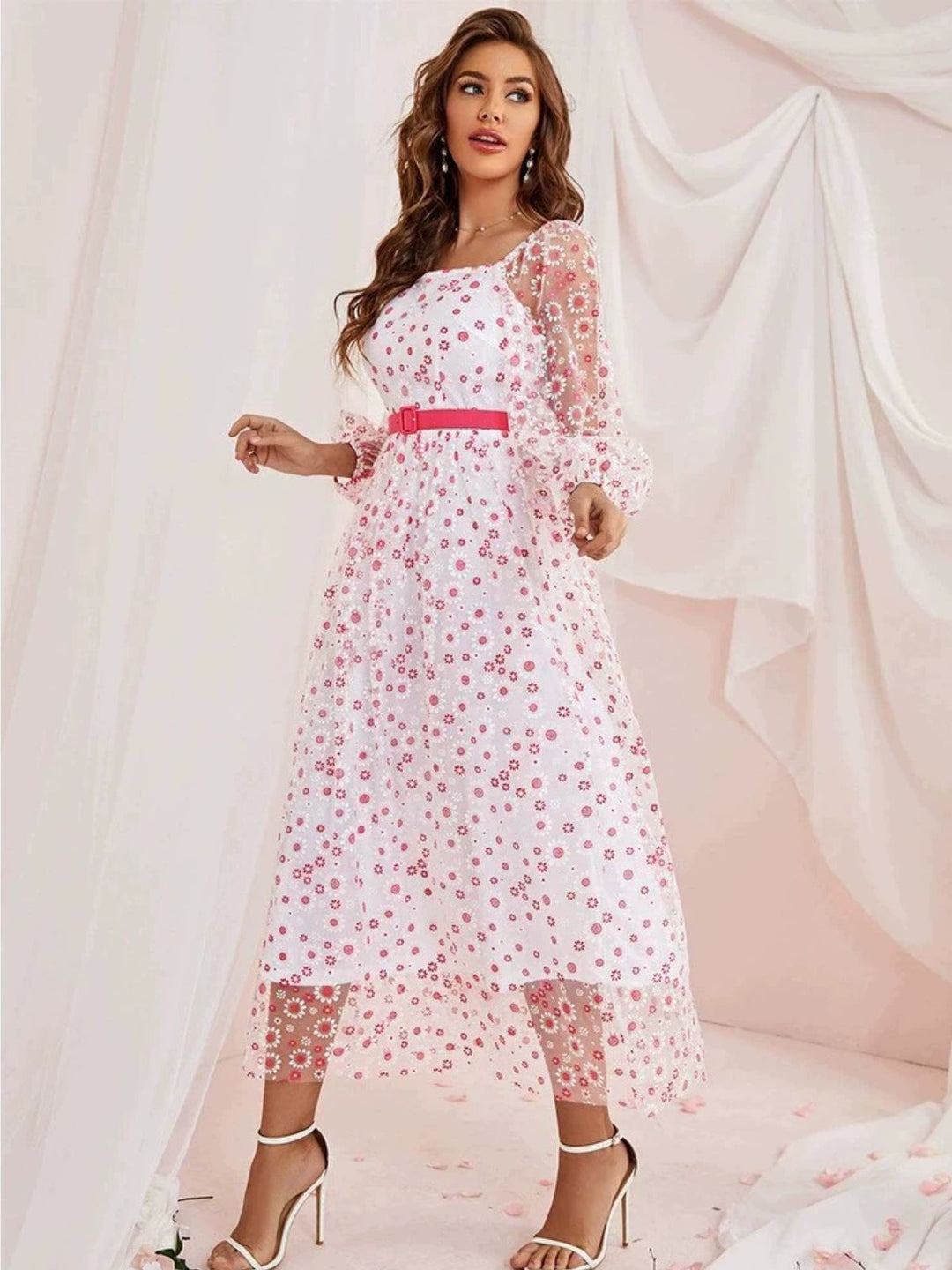 She slips into this 1940s Floral Illusion Square Neck Belt Dress and suddenly it&