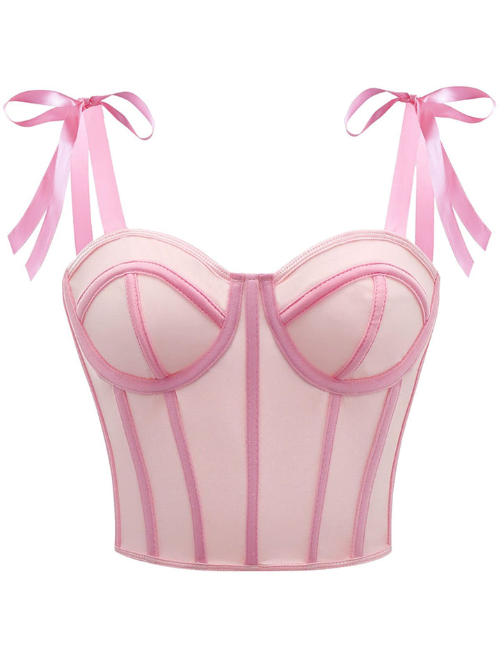 She pairs this 1940s Lace-Up Bow Mesh Corset Crop Camisole with confidence and 1940s charm