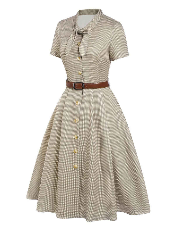This 1940s Small Windowpane Plaid Dress wraps her in 1940s elegance, one twirl at a time