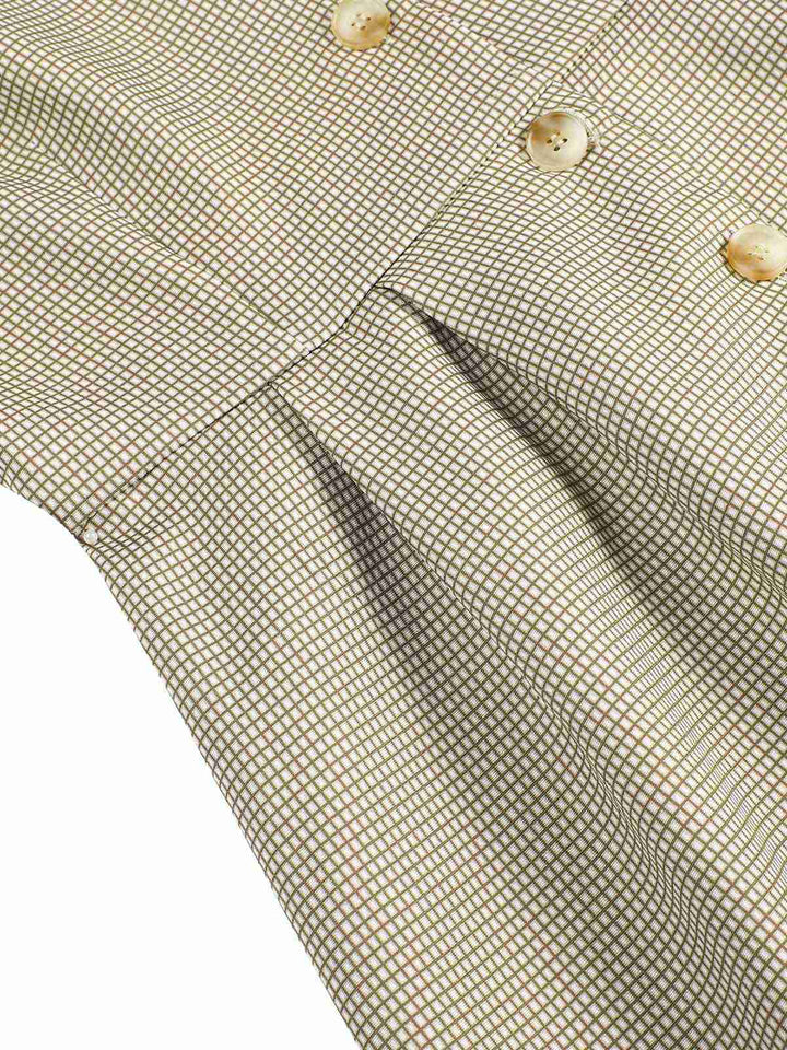She slips into this 1940s Small Windowpane Plaid Dress and suddenly it&