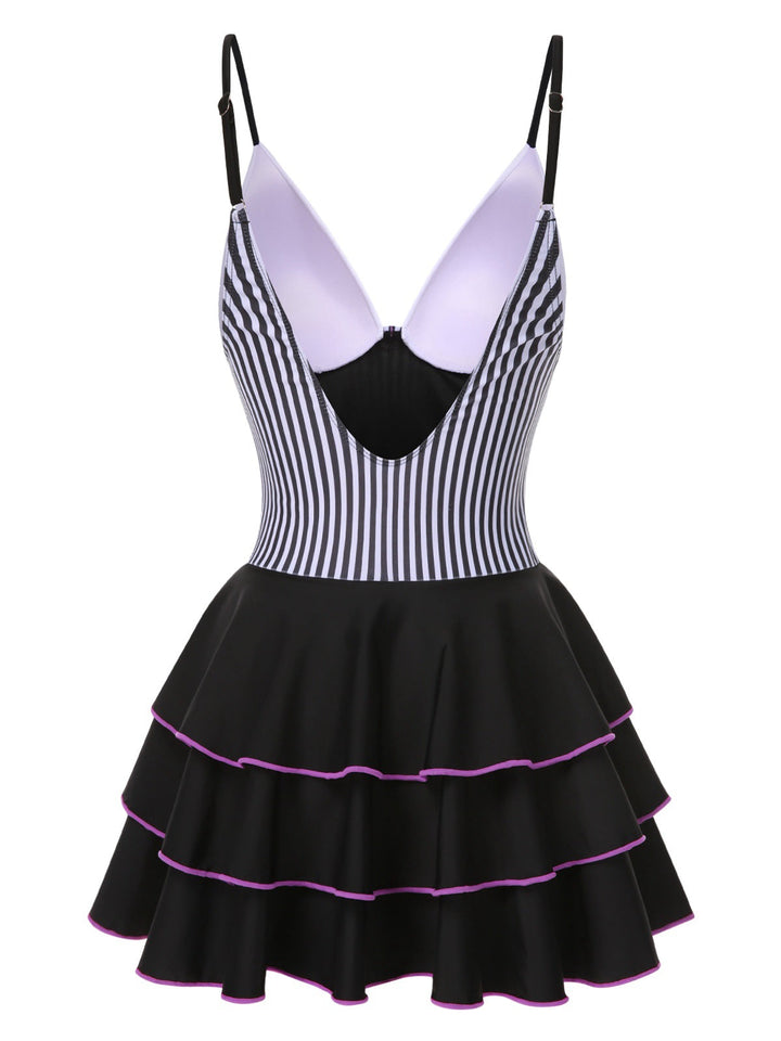 This 1940s Stripe Patchwork Layered Hem Swim Dress wraps her in 1940s elegance, one twirl at a time