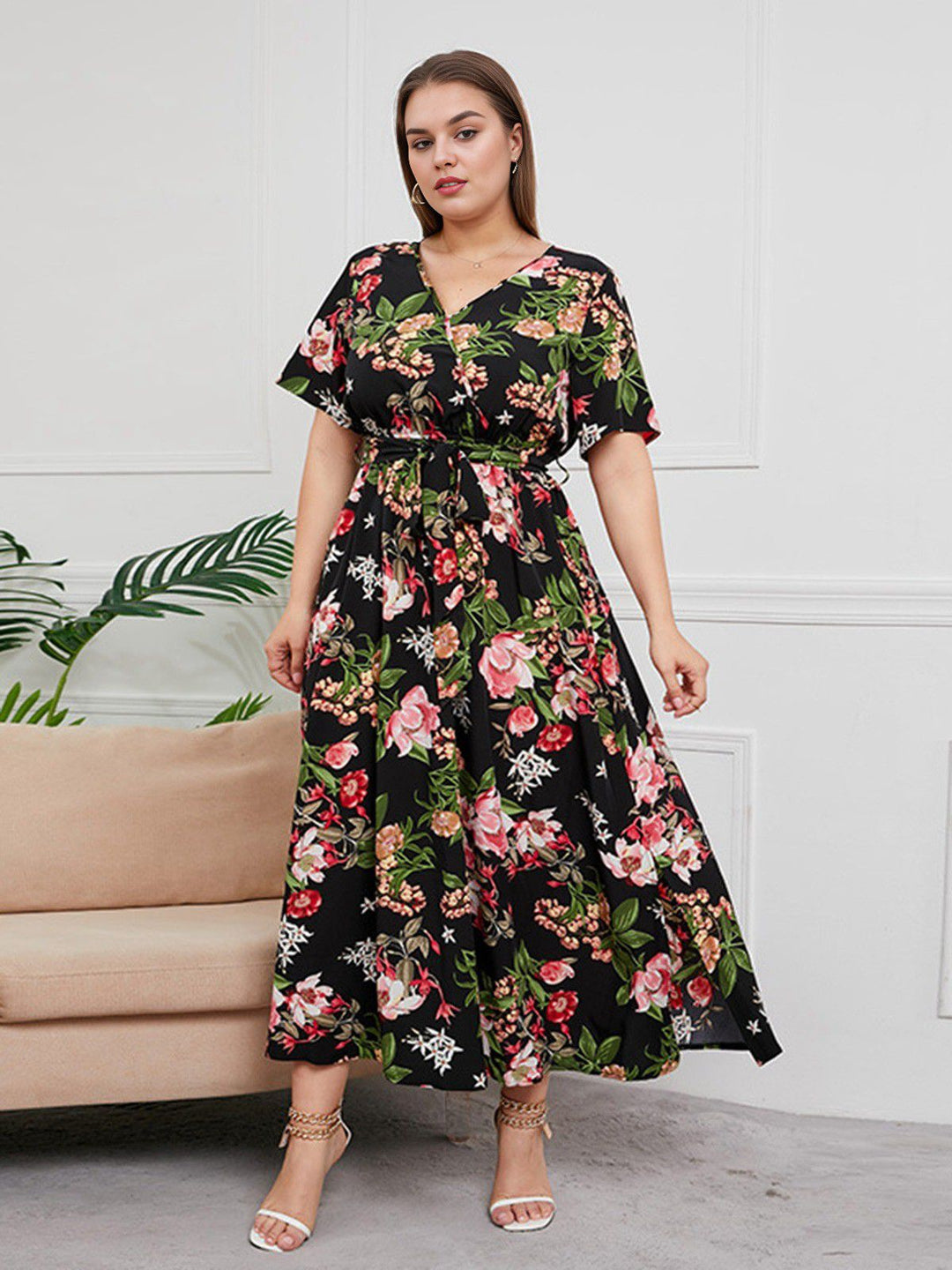 She slips into this 1940s Surplice V-Neck Belted Floral Dress and suddenly it&