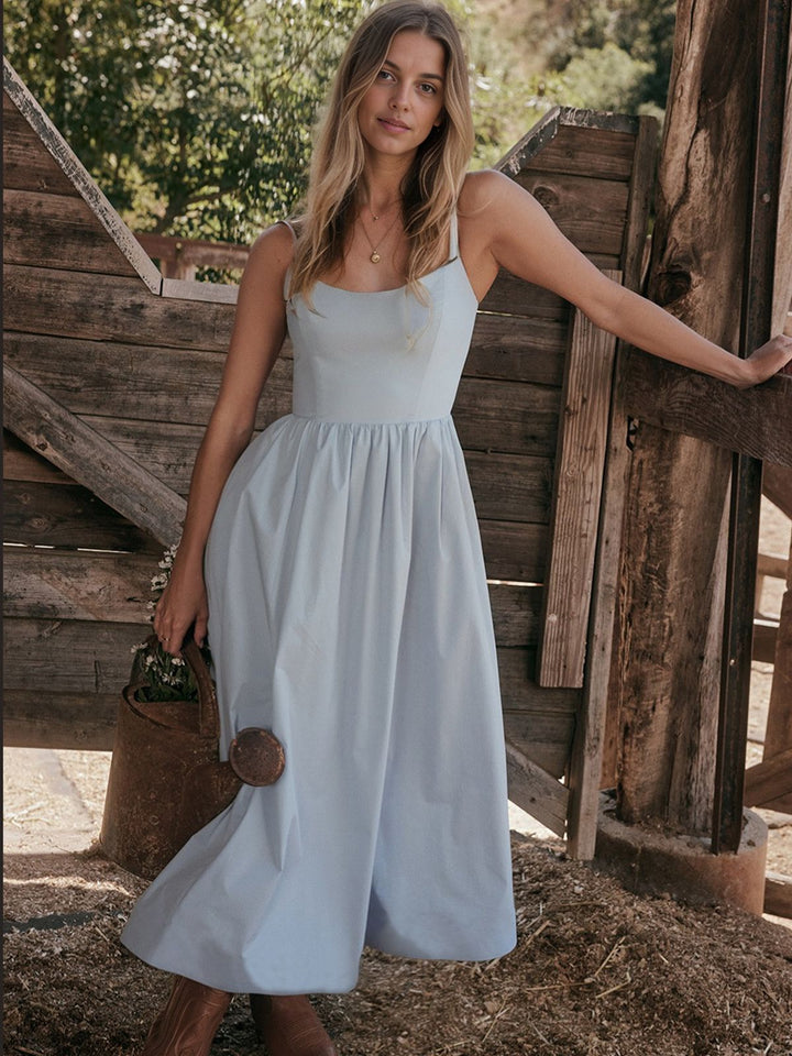 She slips into this 1940s U-Neck Spaghetti Strap Pleated Dress and suddenly it&