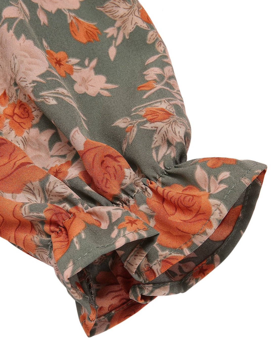 She slips into this 1940s V-Neck Floral Long-Sleeved Dress and suddenly it&