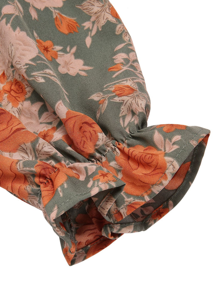 She slips into this 1940s V-Neck Floral Long-Sleeved Dress and suddenly it&