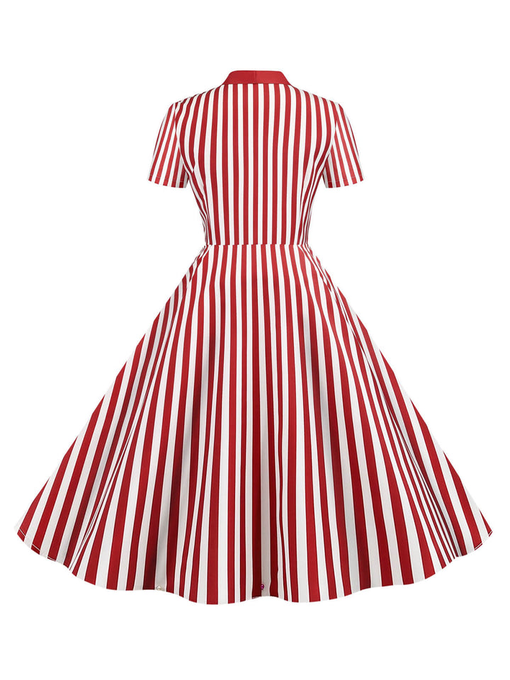 She slips into this 1950s Bow Collar Striped Dots Swing Dress and suddenly it&