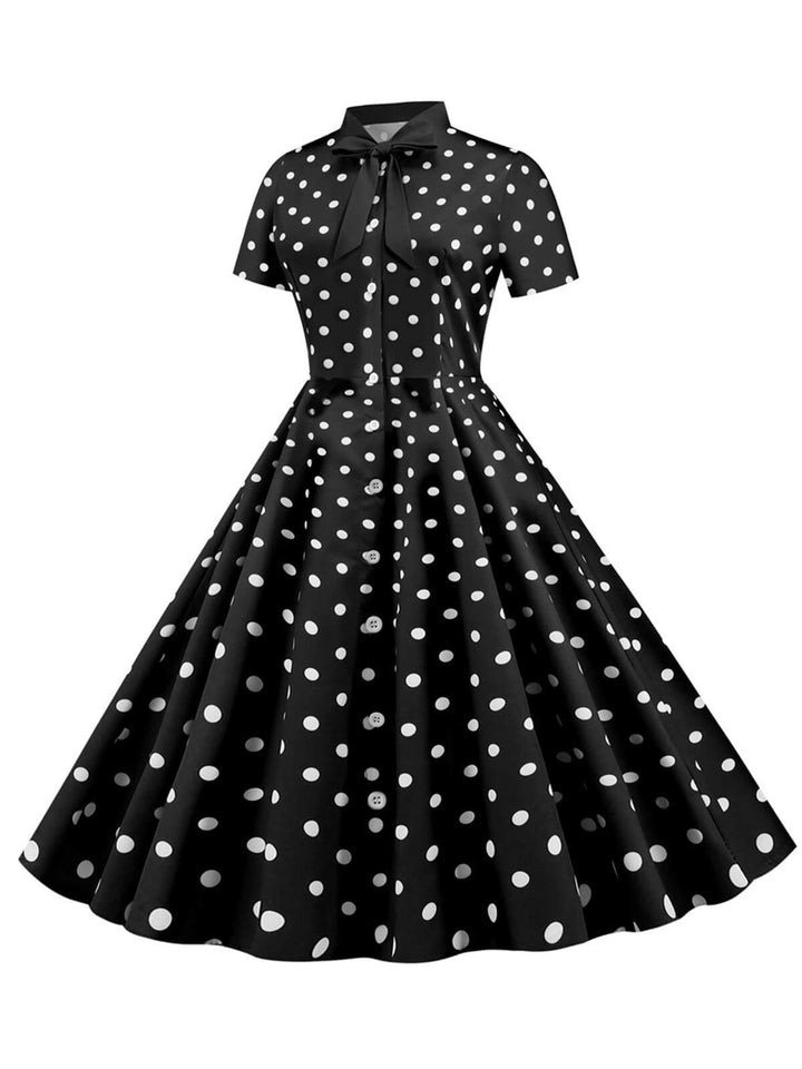 She slips into this 1950s Bow Collar Striped Dots Swing Dress and suddenly it&