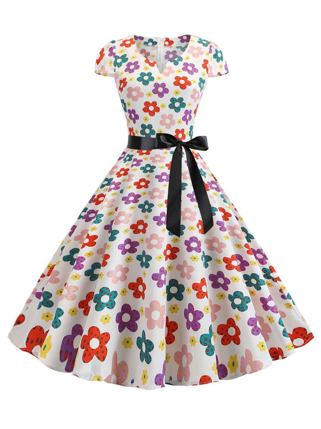 She slips into this 1950s Cap Sleeve Polka Dot Belted Dress and suddenly it&