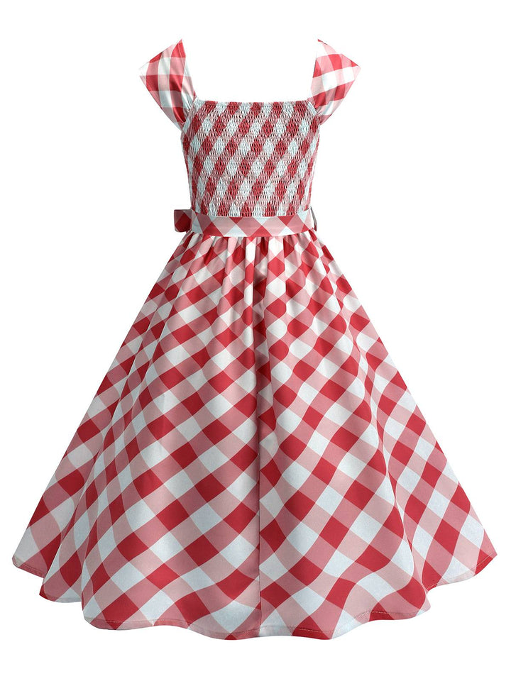 She slips into this 1950s Cap Sleeves Argyle Plaid Swing Dress and suddenly it&