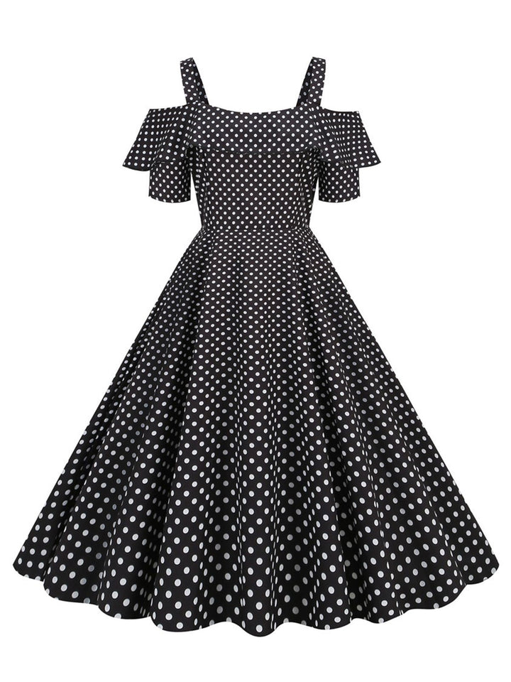 She slips into this 1950s Cold Shoulder Polka Dots Dress and suddenly it&