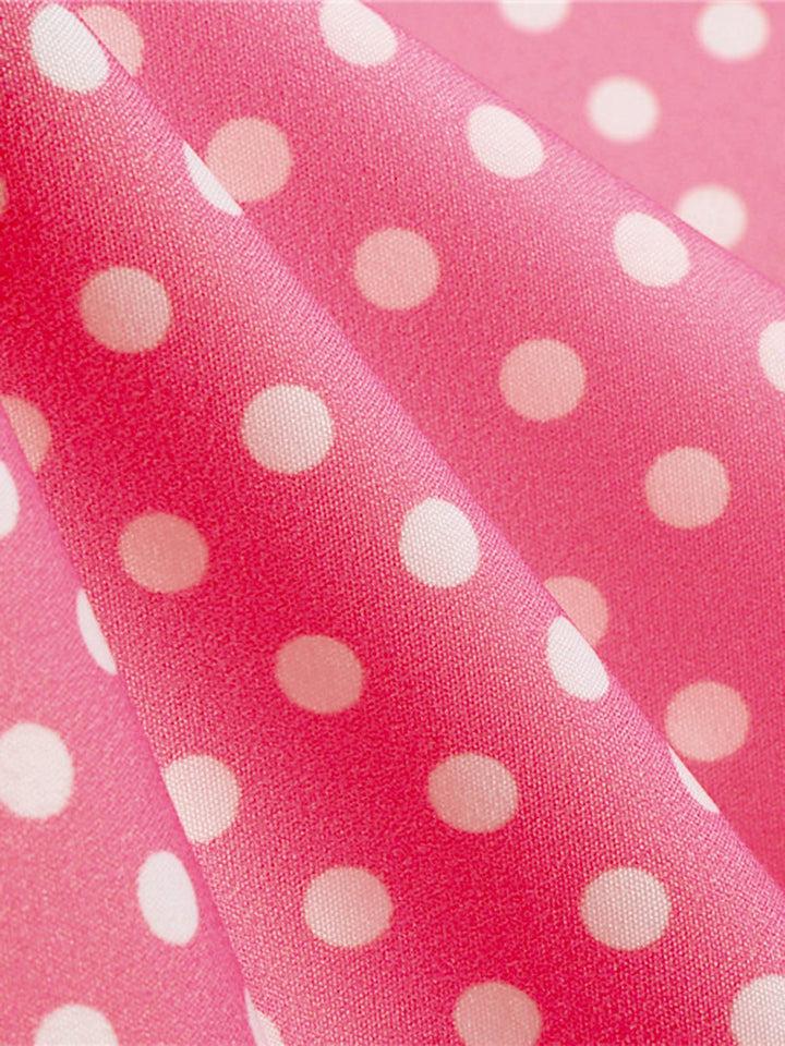 This 1950s Cold Shoulder Polka Dots Dress wraps her in 1950s elegance, one twirl at a time
