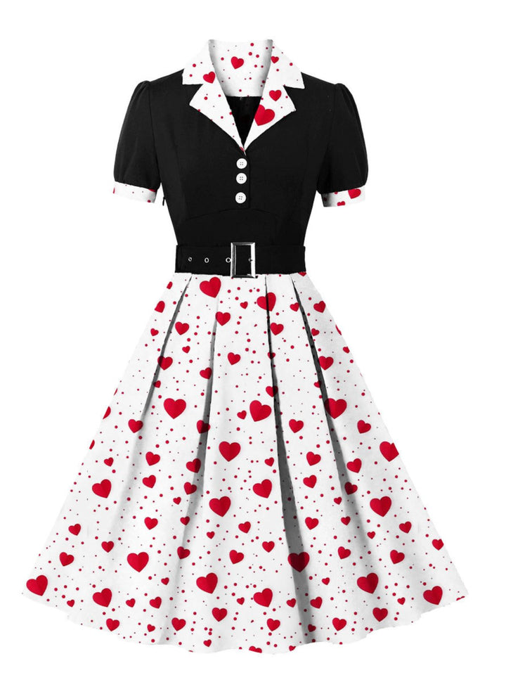 She slips into this 1950s Color Block Polka Dots Lapel Dress and suddenly it&