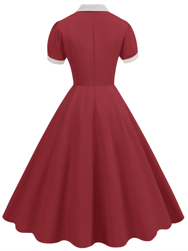 This 1950s Contrast Short Sleeve Lapel Dress wraps her in 1950s elegance, one twirl at a time