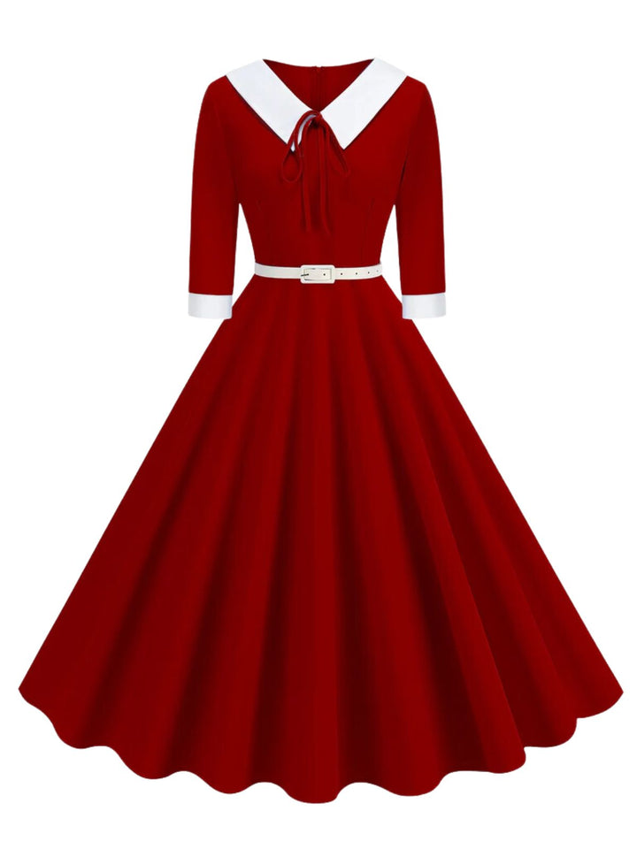 She slips into this 1950s Contrast Tie Neck Belted Lapel Dress and suddenly it&