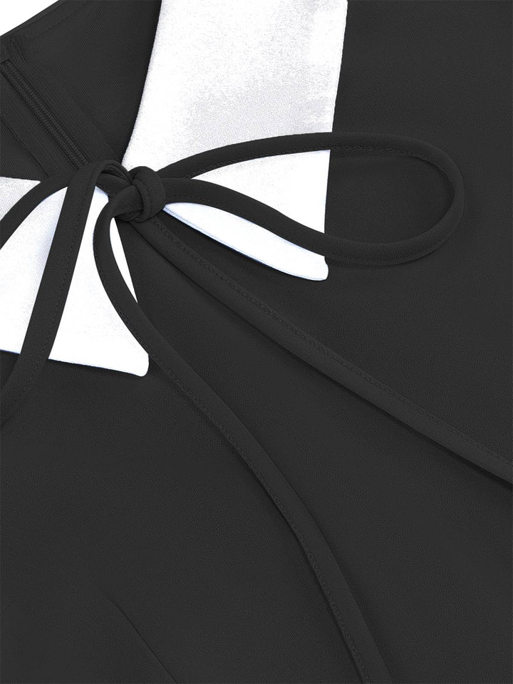 She slips into this 1950s Contrast Tie Neck Belted Lapel Dress and suddenly it&
