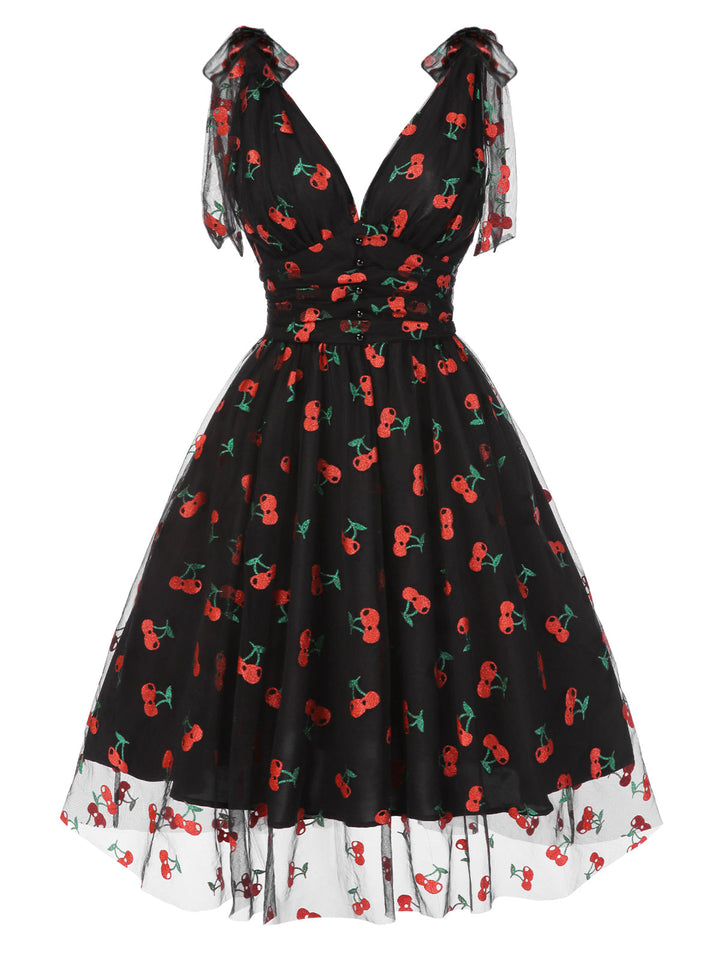 She slips into this 1950s Daisy Mesh Swing Dress and suddenly it&