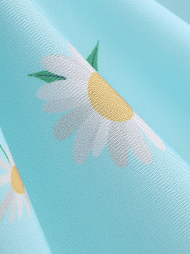 She slips into this 1950s Daisy &amp; Strawberry Print Sleeveless Dress and suddenly it&