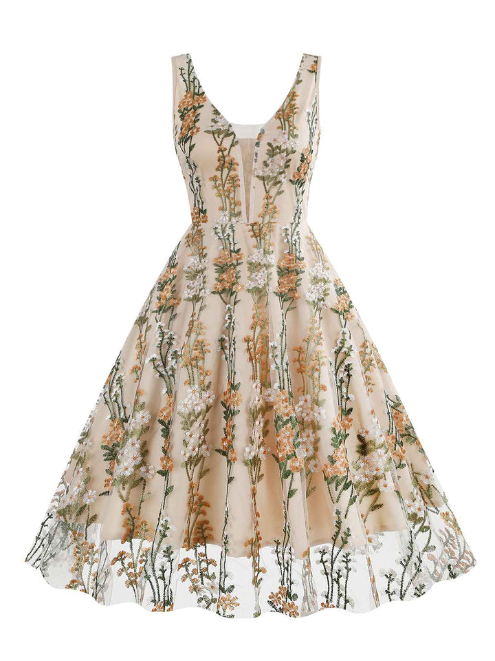 1950s Embroidered Floral V-Neck Swing Dress — a 1950s silhouette that turns sidewalks into runways