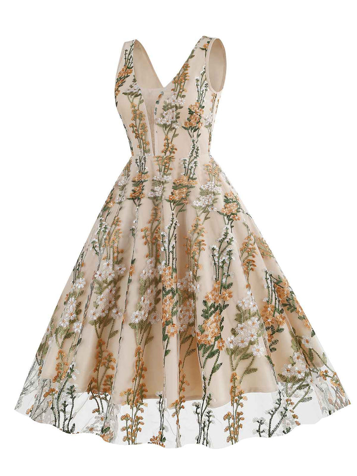 She slips into this 1950s Embroidered Floral V-Neck Swing Dress and suddenly it&