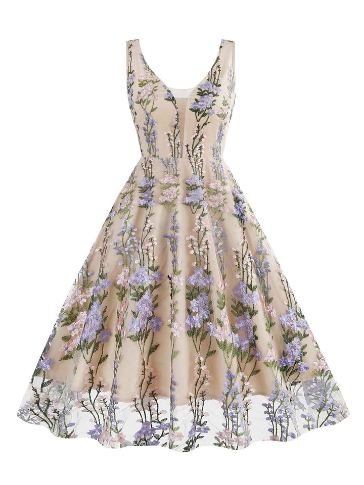 1950s Embroidered Floral V-Neck Swing Dress — vintage elegance for the modern woman
