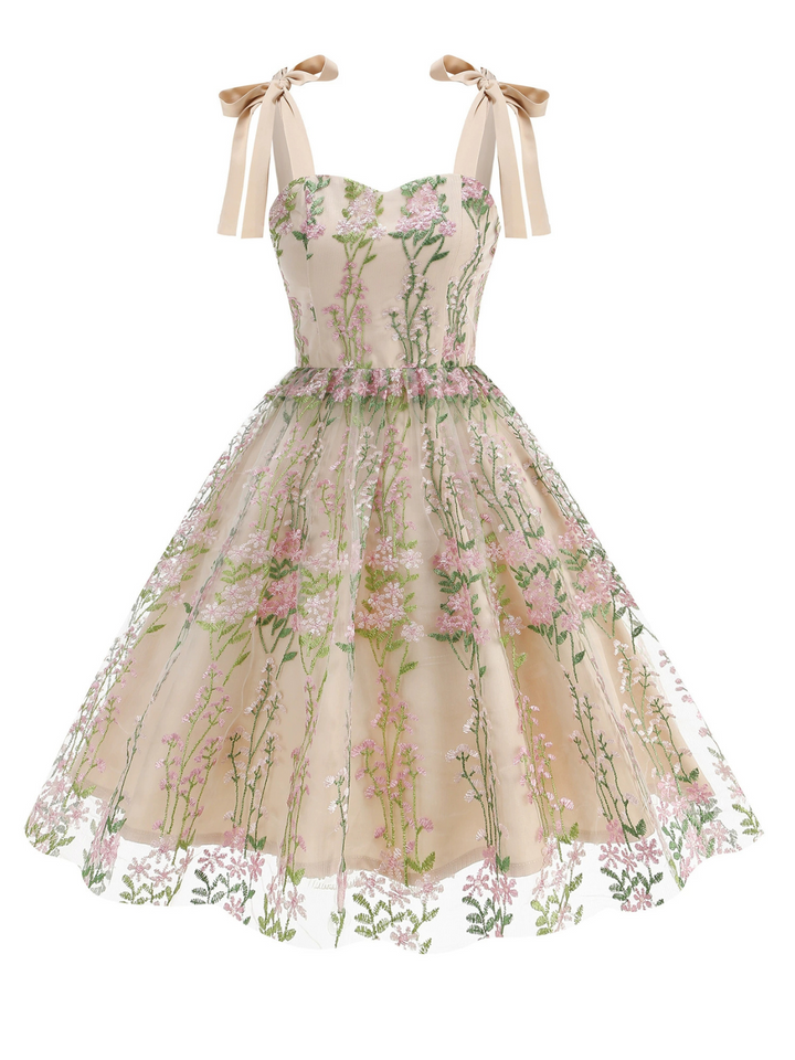 She slips into this 1950s Embroidered Mesh Lace-Up Sweetheart Neck Dress and suddenly it&