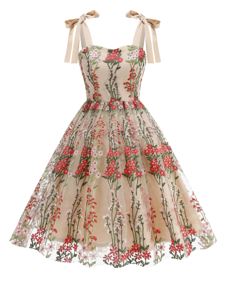 This 1950s Embroidered Mesh Lace-Up Sweetheart Neck Dress wraps her in 1950s elegance, one twirl at a time