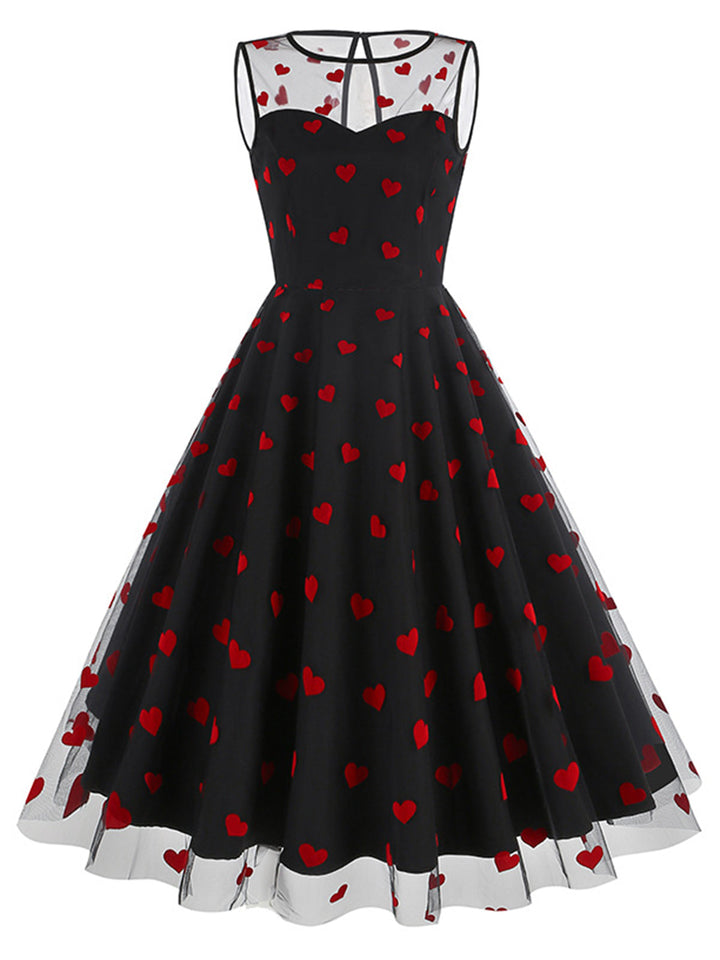 She slips into this 1950s Flocked Heart Mesh Patchwork Dress and suddenly it&