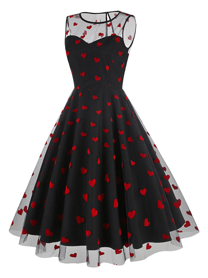 She slips into this 1950s Flocked Heart Mesh Patchwork Dress and suddenly it&