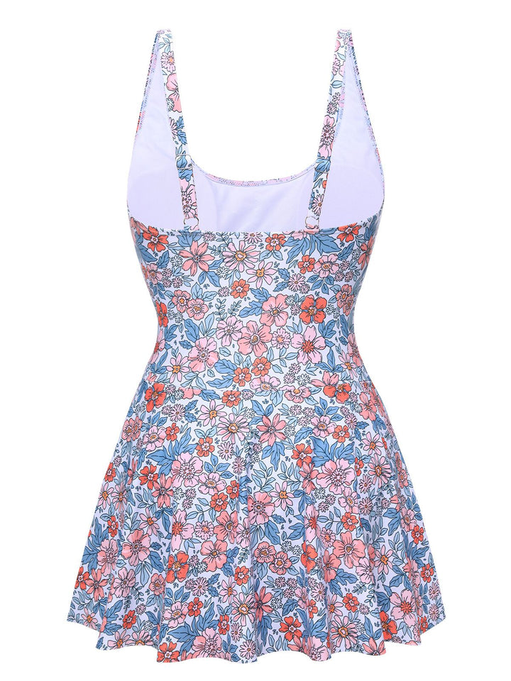 This 1950s Floral Knot Wide Strap Skirt Swimsuit carries 1950s vacation dreams in every stitch