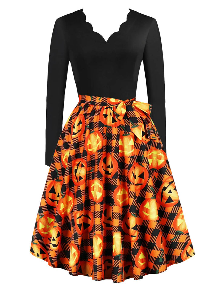 She slips into this 1950s Halloween Pattern Wave Neck Patchwork Dress and suddenly it&
