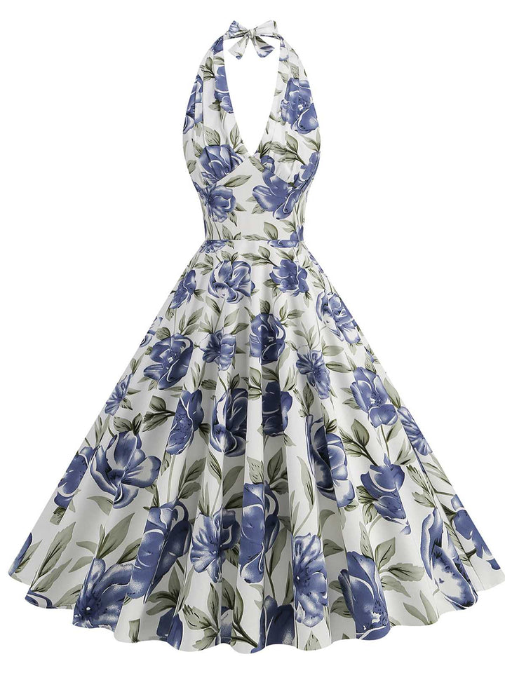 She slips into this 1950s Halter Floral Sleeveless Dress and suddenly it&