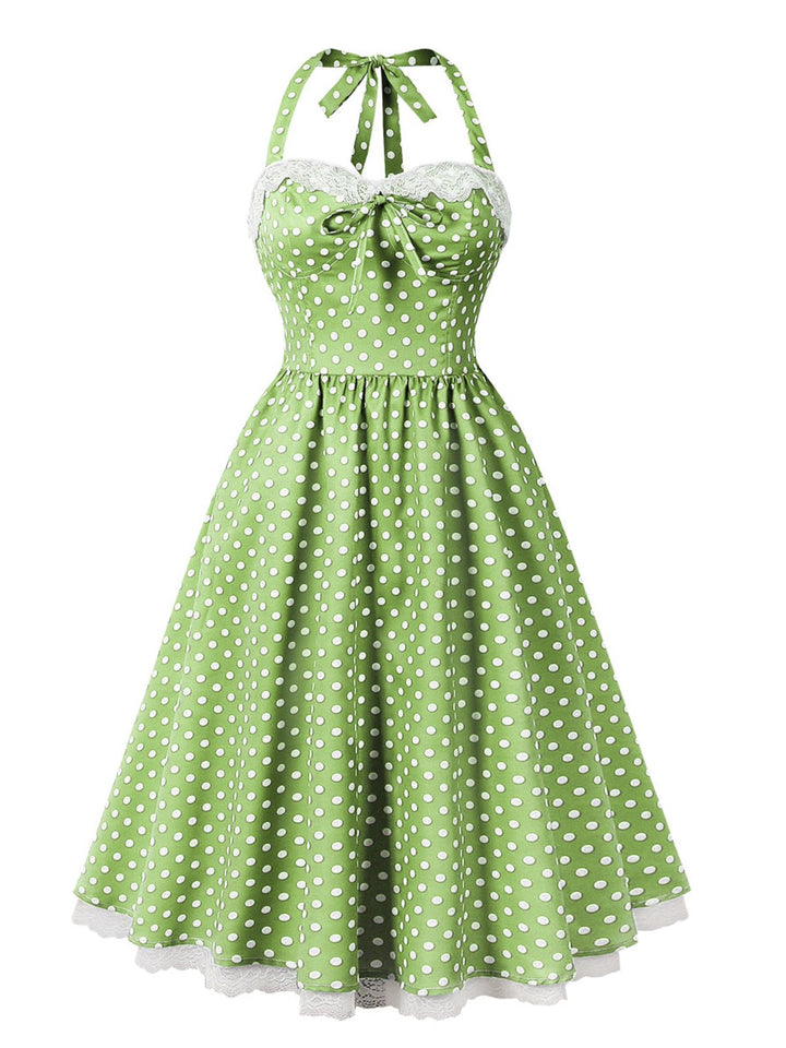 She slips into this 1950s Halter Lace Patchwork Polka Dots Dress and suddenly it&