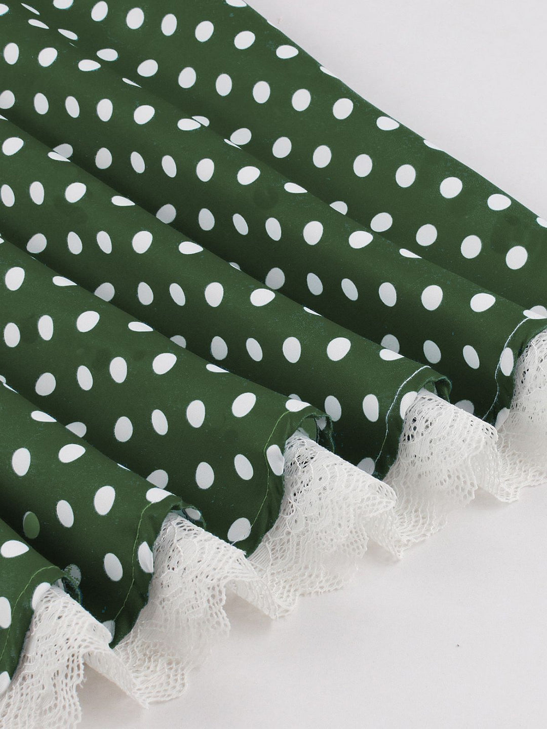 She slips into this 1950s Halter Lace Patchwork Polka Dots Dress and suddenly it&