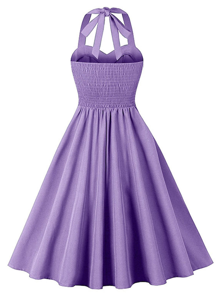 1950s Halter Pockets Backless Swing Dress — the kind of 1950s dress that makes strangers smile