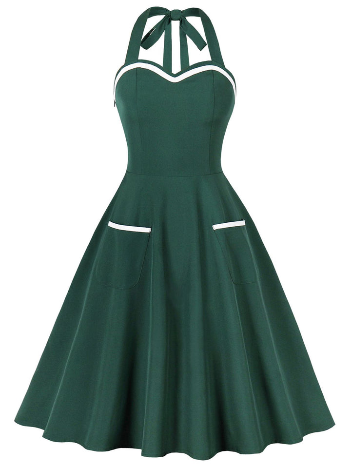 1950s Halter Pockets Backless Swing Dress — the kind of 1950s dress that makes strangers smile