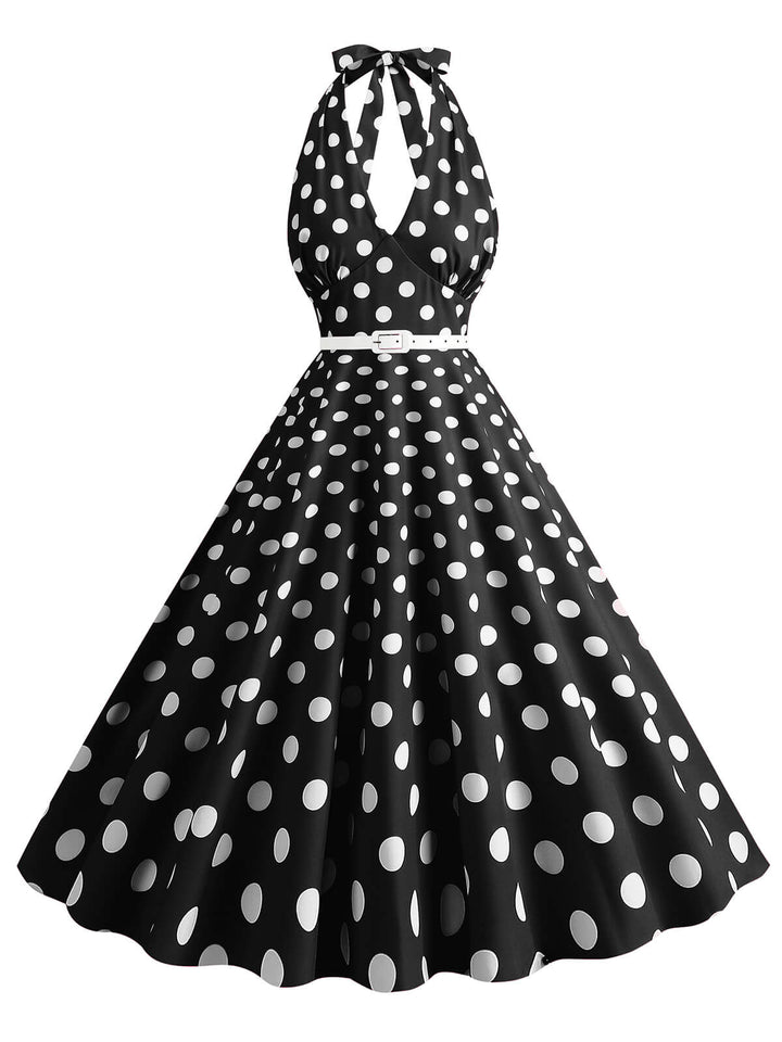 She slips into this 1950s Halter Polka Dot Print Swing Dress and suddenly it&