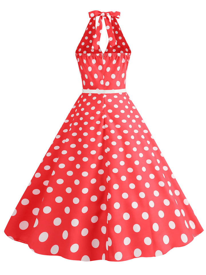 She slips into this 1950s Halter Polka Dot Print Swing Dress and suddenly it&