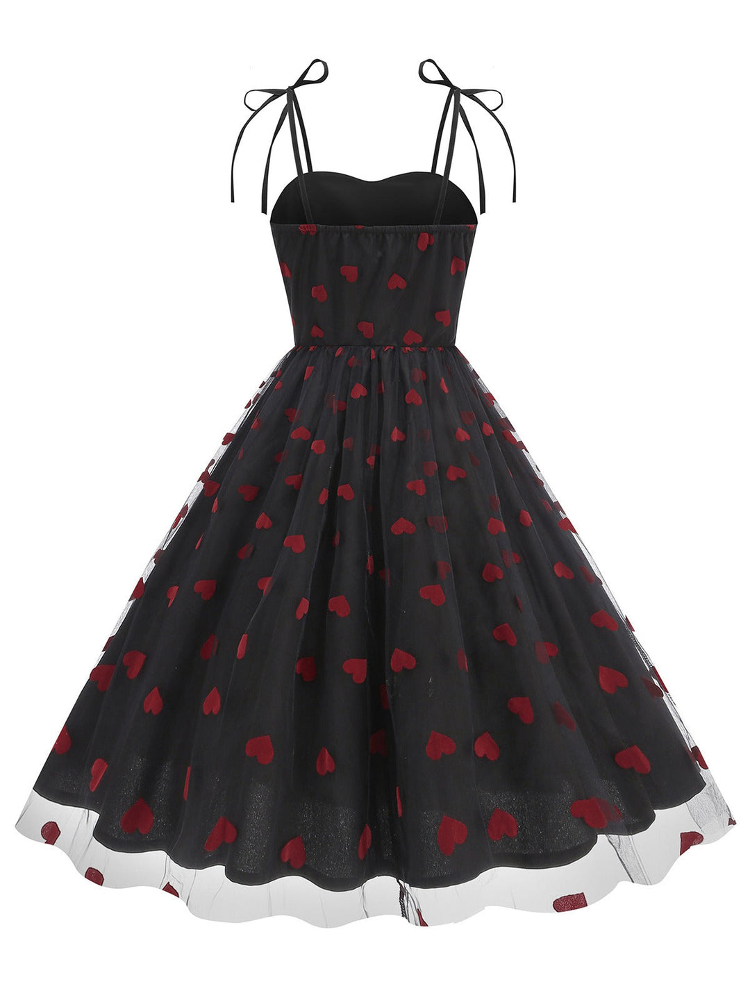 She slips into this 1950s Heart Mesh Patchwork Suspender Dress and suddenly it&